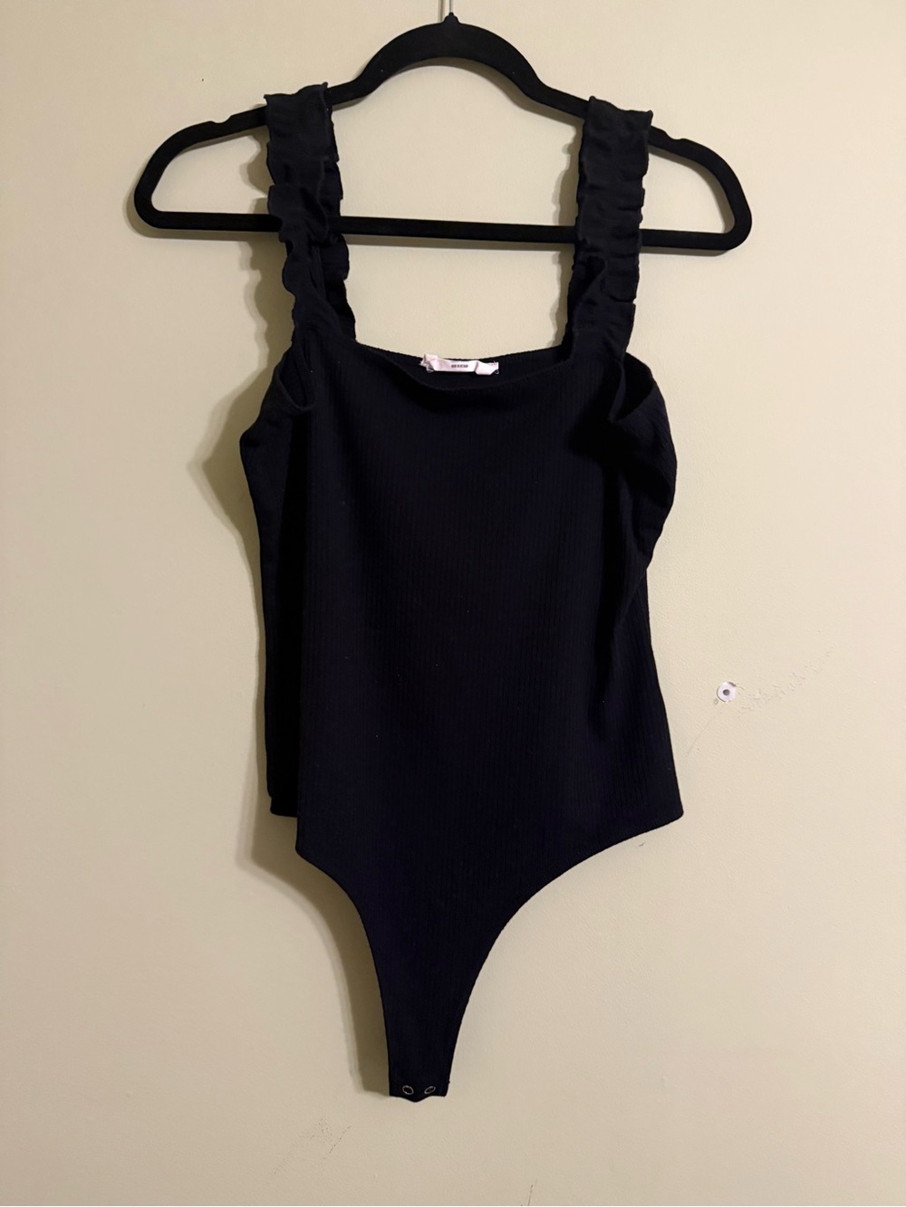 Black Ruffled-Strap One-Piece Bodysuit
